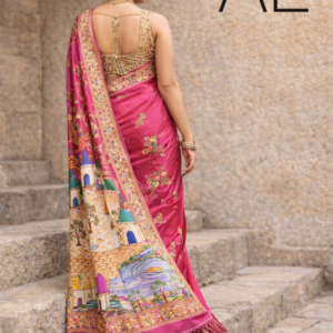 Back view of pink art silk saree showcasing embroidered blouse and heritage pallu artwork